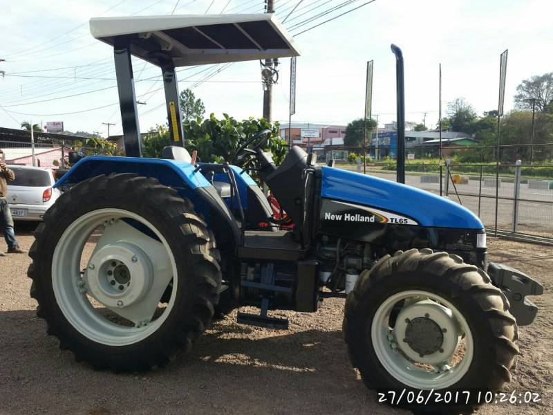 TRATOR NEW HOLLAND TL 65 - 4X4  (DIE 1213) ANO 2002- VENDIDO